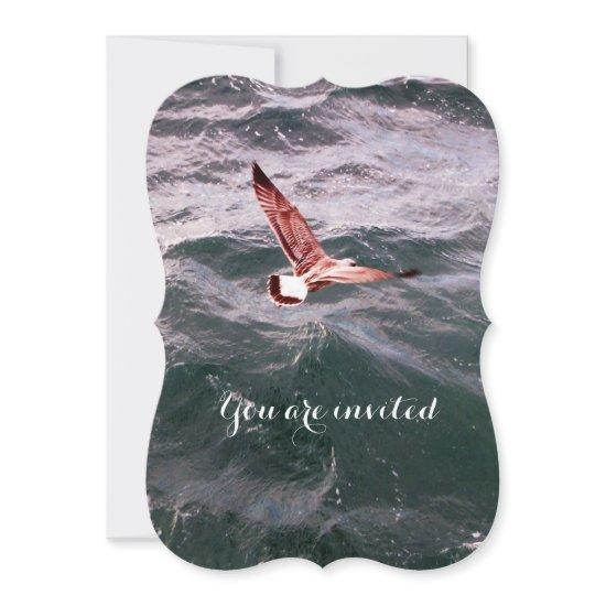 SEAGULL FLYING OVER THE WAVES BEACH WEDDING